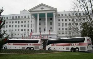 A Charter bus in front of the Greenbrier home.