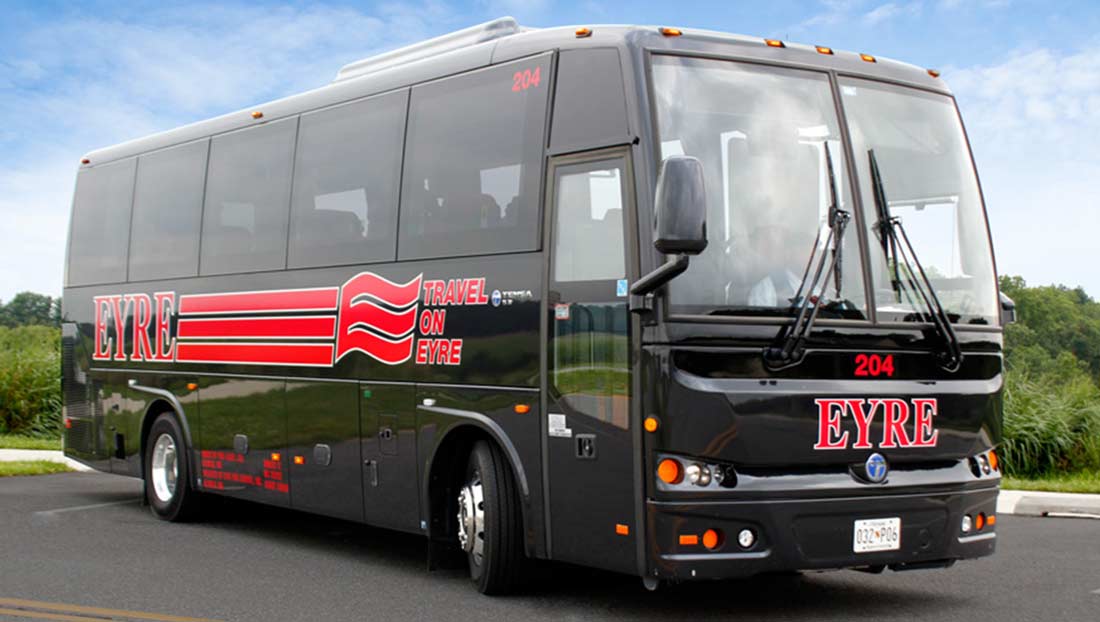 An Eyre 30 passenger coach bus.