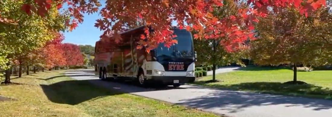 An Eyre charter bus in the fall.